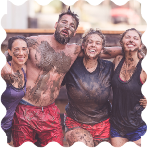 People covered in mud A group of people covered in mud at India Yoga School.