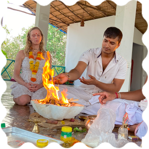 People are doing fire ritual at India Yoga School.