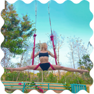 A person from a rope at India Yoga School.